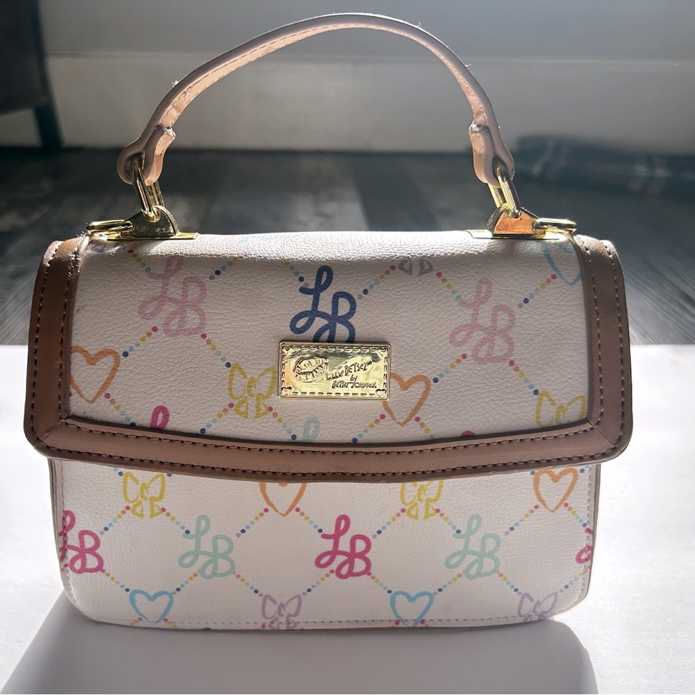 Luv Betsy by Betsy Johnson. What with colorful LB labels. Used about 1 week.